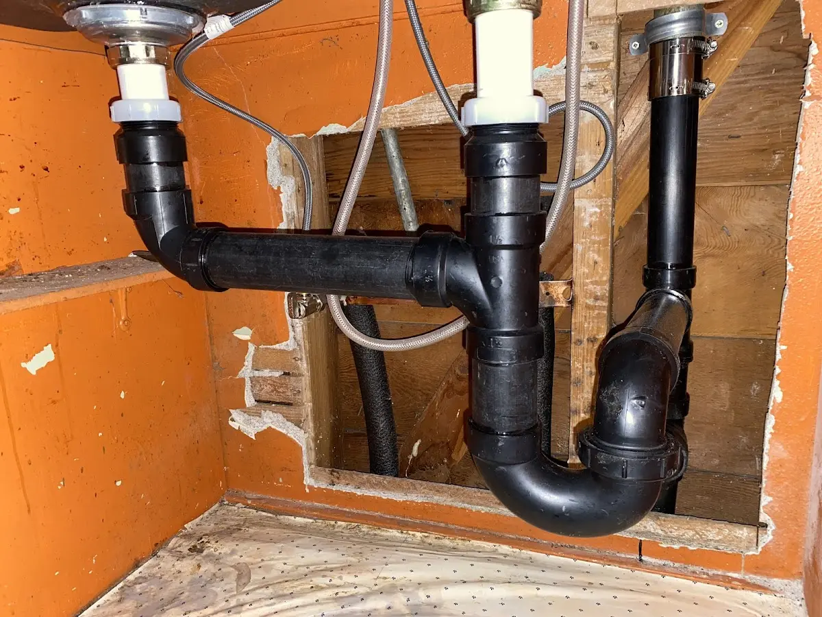 Professional Garbage Disposal Repair equipment and tools on the job in DeSoto